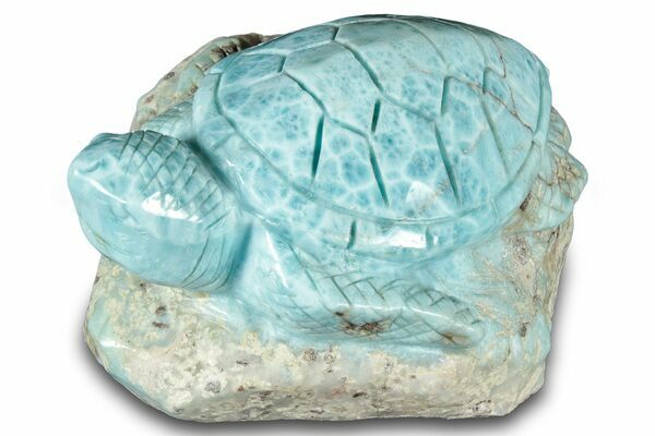 A carved Larimar sea turtle highlighting this stones connection to the Caribbean sea.